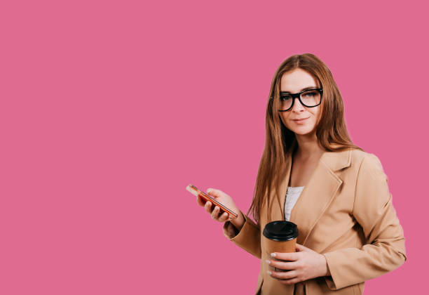 istock Young woman making online payment using mobile phone for shopping 1251523661