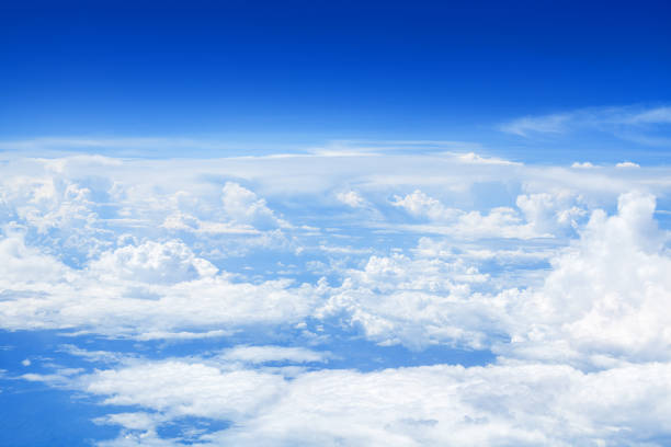 istock White cumulus clouds clear blue sky background, scenic aerial cloudscape view from airplane, high azure skies backdrop, fluffy cloud texture, sunny heaven, cloudy weather, flight landscape, copy space 1251523796