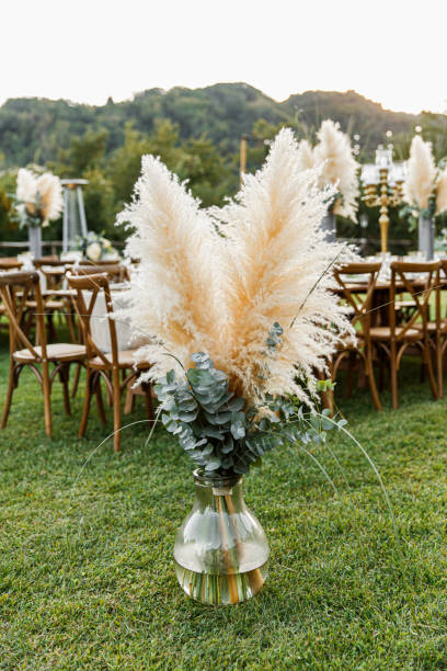istock Wedding table set up in boho style with pampas grass and greenery 1251525034