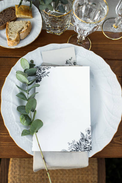 istock Decorated plate with fork and spoon. Table set up in boho style with pampas grass and greenery 1251525054