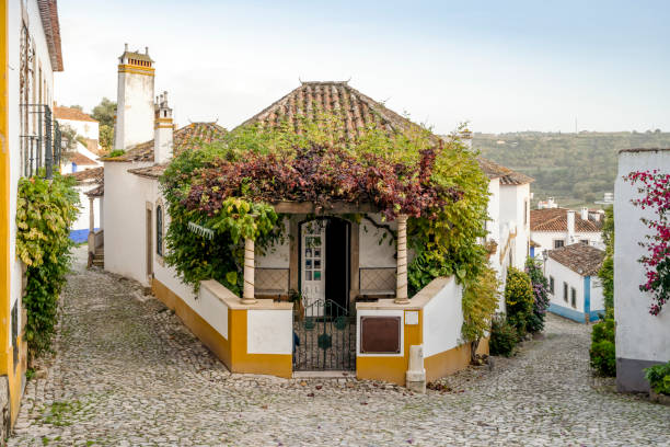 Charming architecture in beautiful town of Obidos surrounded by stone walls, Leiria district, Portugal