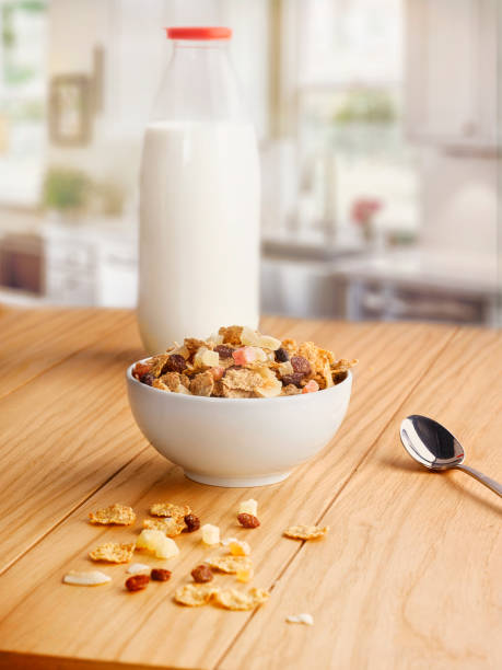 istock Milk bottle and fruity crispy on the kitchen table. 1251525638