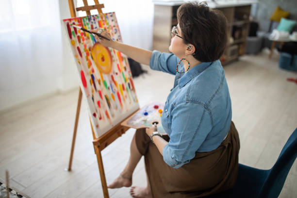 istock Artist making fine art at home studio 1251531875