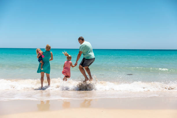 istock Jumping in the Sea 1251536958