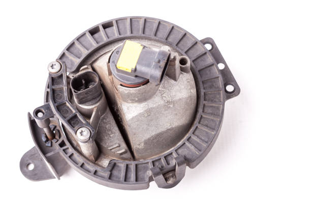 Rear view spare part for sale at an auto-parsing or repair of a car body after an accident and damage in service on a white isolated background in a photo studio - plastic fog lamp panel with mounts pieza de repuesto de vista trasera para la venta en un auto-parsing o reparación de la carrocería de un coche después de un accidente y daños en servicio en un fondo blanco aislado en un estudio fotográfico - panel de lámpara antiniebla de plástico