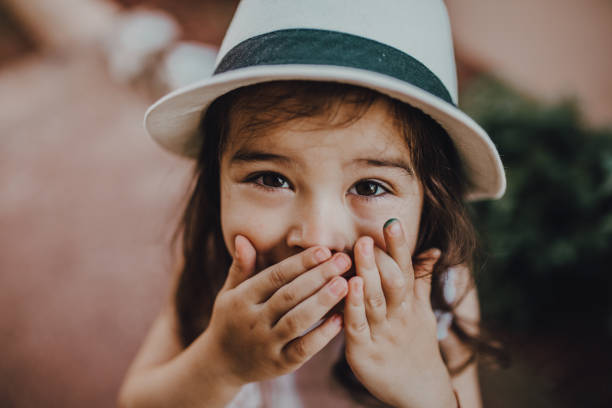 Cute little girl with her summer hat