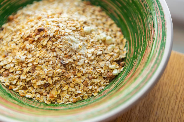 istock Uncooked oatmeal breakfast served on table at home 1251547727