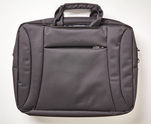 istock Dark gray laptop bag on white background. Top view. 1251548980