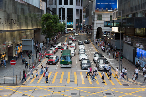 Hong Kong, Hong Kong - June 23, 2020 : People wearing face masks at Central District, Hong Kong.
