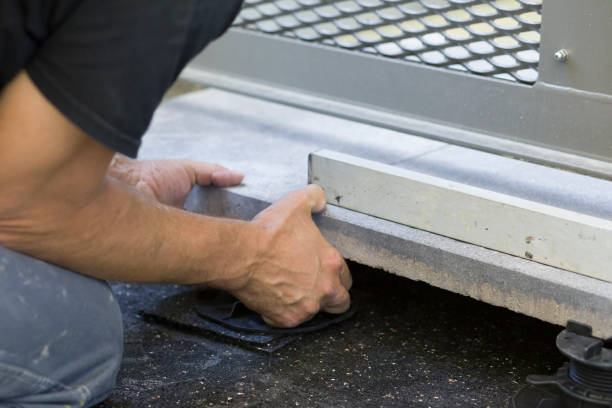 istock Laying concrete slabs on an adjustable bracket with smooth height adjustment 1251559051