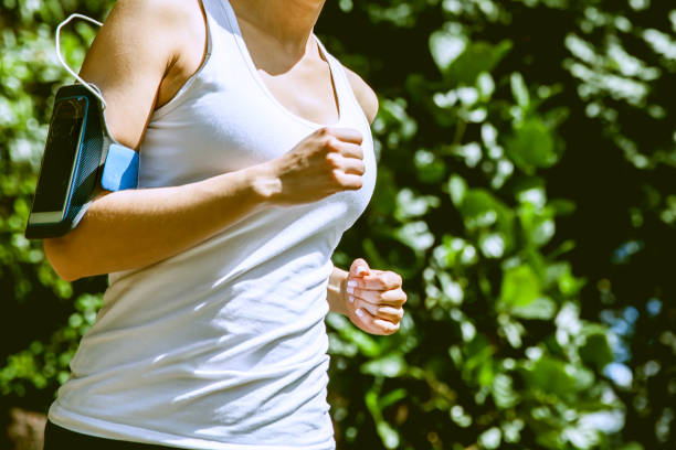 istock Unrecognizable woman running outdoors 1251561365