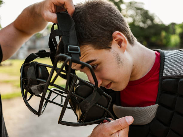 istock Young catcher and the coach 1251563192