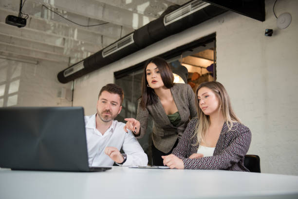 istock Business people having serious discussions 1251564337
