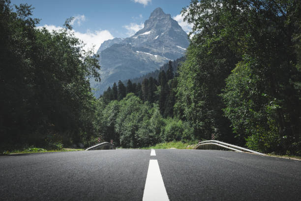 istock Mountain road. Road curve. Travel 1251565452