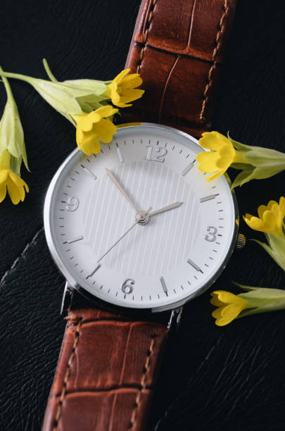 istock Elegant watch on a black background for the designer 1251571416