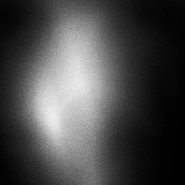 istock blurry unfocused background with light leaks and grain. 1251571517