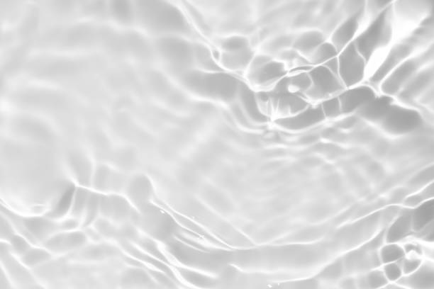istock desaturated transparent clear calm water surface texture 1251573519
