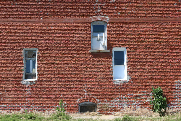 istock old vintage warehouse windows red brick building 1251573806