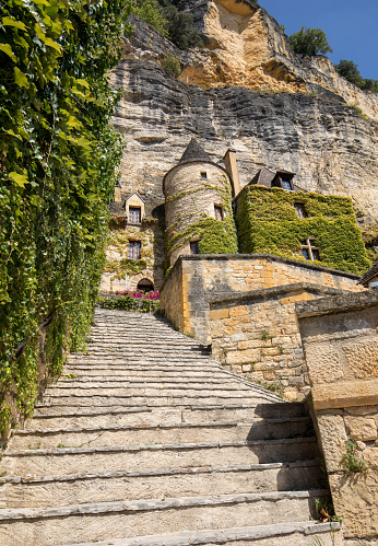 La Roque-Gageac, Dordogne, France - September 7 2018: A majestic stone staircase in La Roque-Gageac a charming town in the Dordogne valley. France