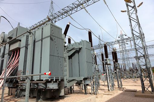 Electric power station on blue sky background