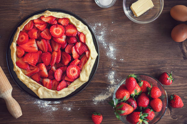 istock Preparing strawberry galette or open strawberry pie 1251575184