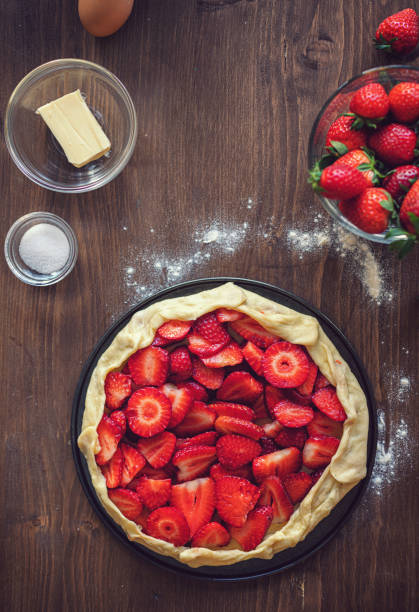 istock Preparing strawberry galette or open strawberry pie 1251575327