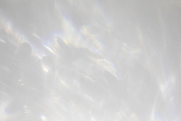 istock diagonal shadow and rays of light on a white background 1251576173