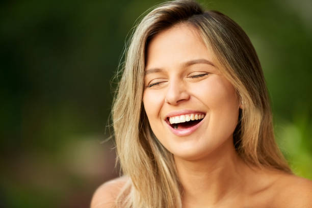 istock Smiling beautiful woman 1251580609