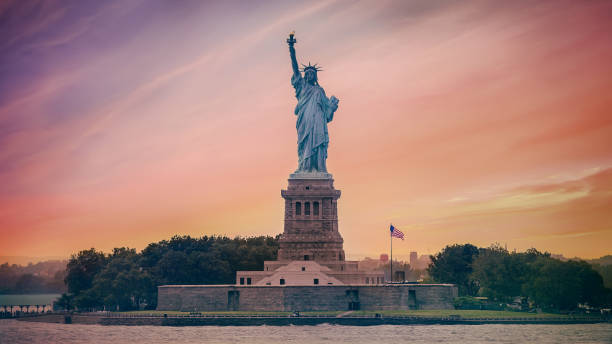 istock statue of liberty at sunset 1251581627