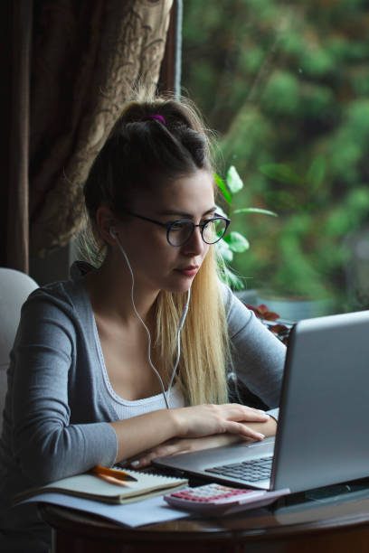 young woman working from home