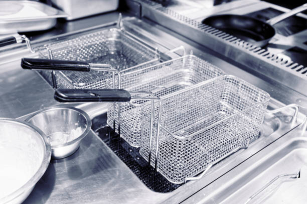 istock Friture cooker in restaurant kitchen, toned 1251586957