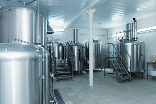 istock Beer-making tanks, small capacity brewery, toned 1251587011