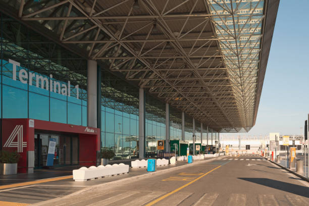 Terminal 1 at Rome–Fiumicino International Airport "Leonardo da Vinci" in Fiumicino, Rome, Italy Rome, Italy - June 1, 2020: Terminal 1 at Rome–Fiumicino International Airport "Leonardo da Vinci" (IATA: FCO, ICAO: LIRF) in Fiumicino, Rome, Italy. The International Airport "Leonardo da Vinci" is the major airport in Italy. terminal tower stock pictures, royalty-free photos & images