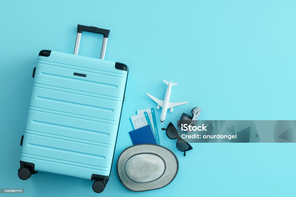 Travel Concept on Blue Background Travel Stock Photo