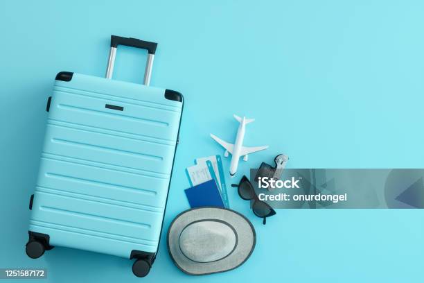 Travel Concept On Blue Background Stock Photo - Download Image Now - Travel, Suitcase, Vacations