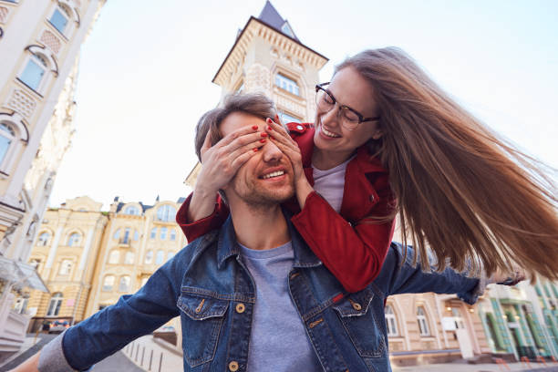 istock Adorable young couple resting outdoors with fun 1251588203