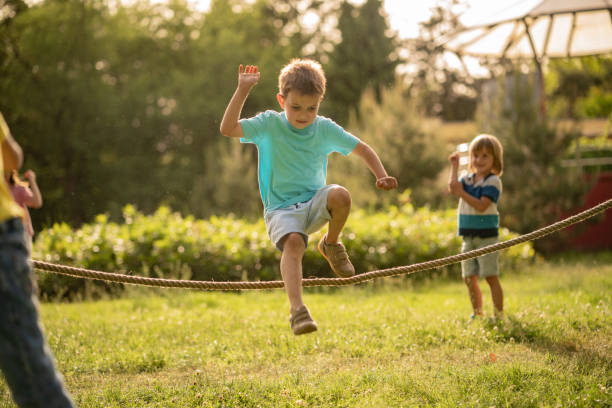 istock Boy is jumping over a rope 1251589198