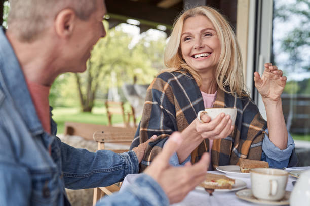 istock Jolly mature spouses having fun during breakfast in villa 1251601458