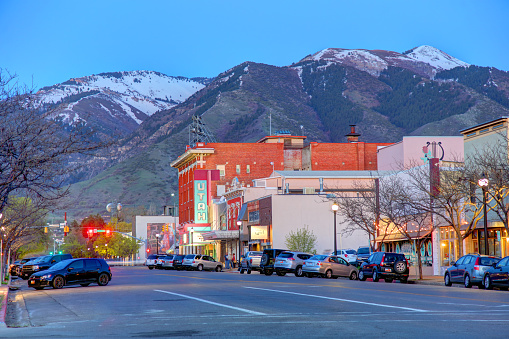 Logan, Utah, USA - April 26, 2019: Evening view of storefronts along W Center St in the downtown business district