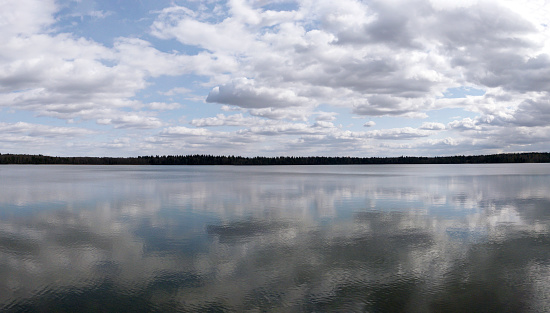Svityaz lake in the Belarus with cloudy sky. spring panoramic landscape