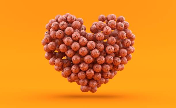 Heart gender shape made of basketball balls Heart gender shape made of basketball balls on orange background. 3d illustration heart shaped basketball stock pictures, royalty-free photos & images