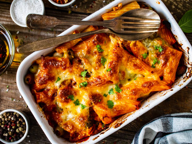 istock Pasta casserole with barbecue chicken breast, cheese and vegetables 1251639619