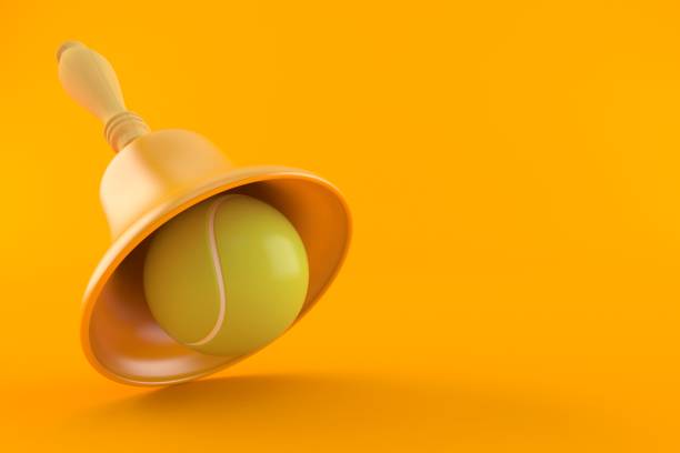 istock Tennis ball with hand bell 1251639704