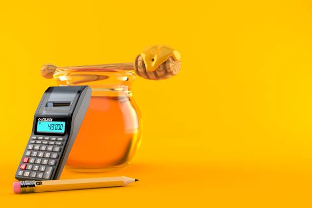 istock Honey jar with calculator and pencil 1251640356
