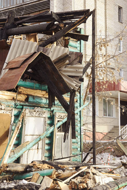 istock Demolition house using excavator in city. Rebuilding process. Remove equipment 1251644516