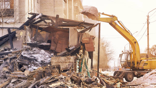 istock Demolition house using excavator in city. Rebuilding process. Remove equipment 1251644540