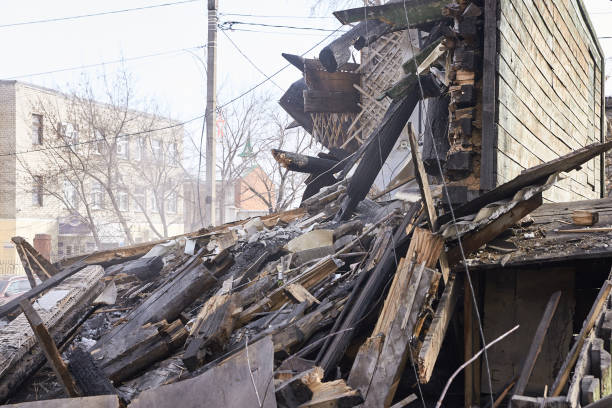 istock Demolition house using excavator in city. Rebuilding process. Remove equipment 1251644542
