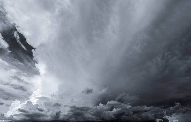 istock Dark dramatic sky and clouds. Background for death and sad concept. Gray sky and fluffy white clouds. Thunder and storm sky. Sad and moody sky. Nature background. Dead abstract background. Cloudscape. 1251649803