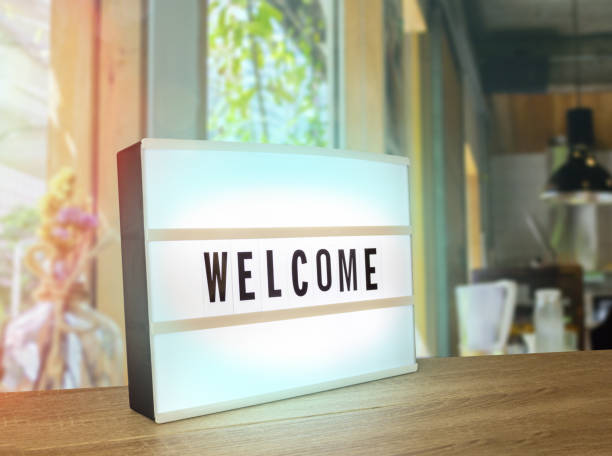 istock Welcome text sign banner in cafe view 1251654007