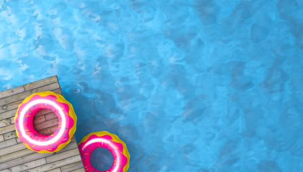 istock colorful inflatable ring donut toy in swimming pool water,3d rendering 1251657844